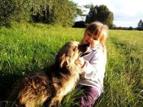 Girl playing with her Dog