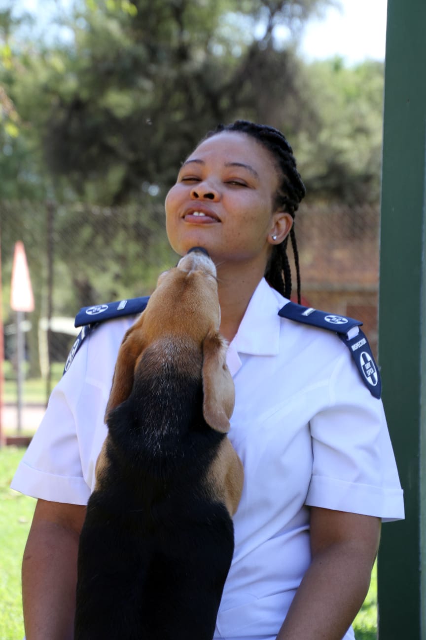 NSPCA Inspector with petting a Dog